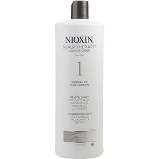 Nioxin Bionutrient Actives Scalp Therapy System 1 for Fine Hair 33.8 OZ bottle.