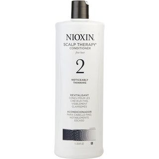 Nioxin Bionutrient Actives Scalp Therapy Conditioner System 2 for Fine Hair 33.8 OZ bottle.