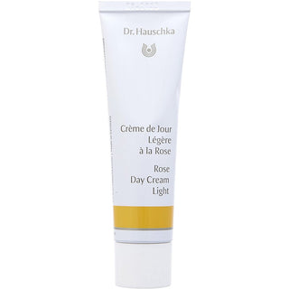 Dr. Hauschka Rose Day Cream Light, 30g jar, on a rose petal backdrop.