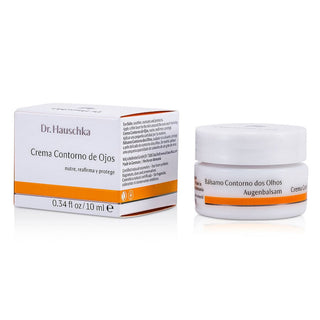 Dr. Hauschka Eye Balm 0.34oz jar with botanical elements.