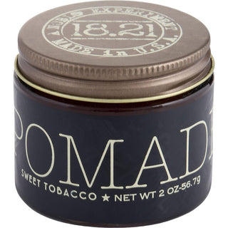 18.21 Man Made Pomade 2oz tin with a sleek design and signature Sweet Tobacco scent.