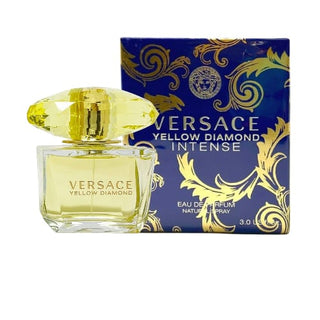 Versace Yellow Diamond Intense: The luxurious bottle and its elegantly designed box, with the bottle gracefully standing in front, offering a captivating display of sophistication, available at fragrancedealz.com