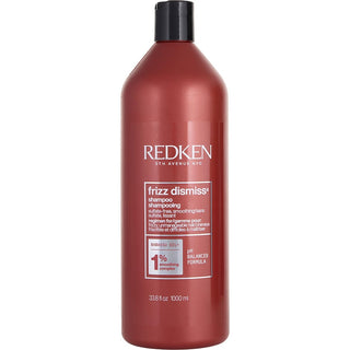 Redken Frizz Dismiss Shampoo 33.8 oz bottle for taming frizz and flyaways, available at fragrancedealz.com