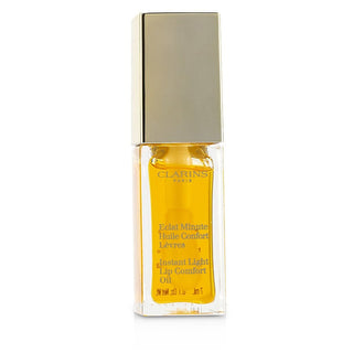 Clarins Lip Comfort Oil #01 Honey, 0.1oz bottle. Buy now at fragrancedealz.com.