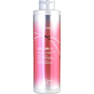 Joico FLIP TURN VOLUMIZING FINISHING SPRAY 9 OZ can with sleek design.