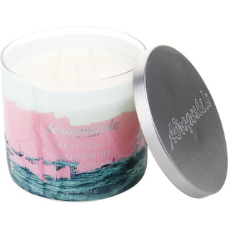 Aeropostale Magnolia & Grapefruit Scented Candle 14.5oz glass jar with an elegant design.