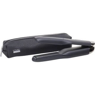 A sleek, black GHD Gold Professional 1" Styler Flat Iron with smooth, contoured plates for versatile styling.