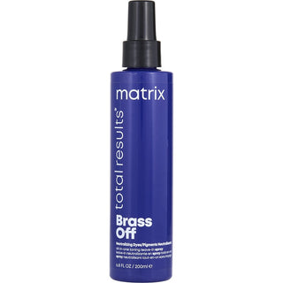 A bottle of Total Results BRASS OFF All-In-One Toning Leave-In Spray, 6.8 oz, for toning and conditioning blonde hair.