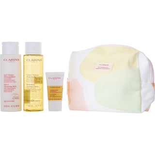 Clarins Cleansing Milk, Toning Lotion, and Comfort Scrub 3-piece set with travel bag. Buy now at fragrancedealz.com.