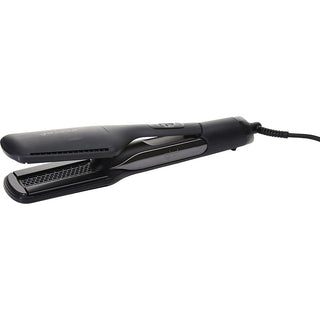 A sleek, white GHD Unplugged Styler Cordless Flat Iron, perfect for on-the-go styling with dual-zone technology.