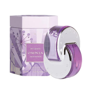 Omnia Amethyste Perfume: A front view of the elegant box, complemented by a side view of the graceful bottle, with the bottle standing in front, presenting a harmonious blend of sophistication and allure, available at fragrancedealz.com