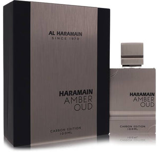 Al Haramain Amber Oud Carbon Edition cologne bottle with a sleek black design and distinctive features, displayed at fragrancedealz.com.m