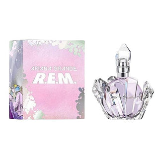 Bottle and box of Ariana Grande R.E.M. Perfume, embodying cosmic elegance and charm. Explore the universe of fragrance at fragrancedealz.com