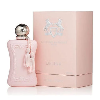 Delina Exclusif perfume bottle gracefully positioned on the left in front of its box on Fragrancedealz.com