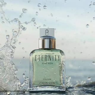 Eternity Cologne for Men bottle with water splashes and a serene ocean backdrop.