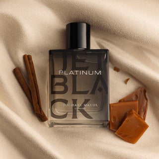 Unleash your bold signature with Jet Black Platinum—a masterful blend of  oakmoss, and amber, all placed on rich velvet. Available now at FragranceDealz.com.