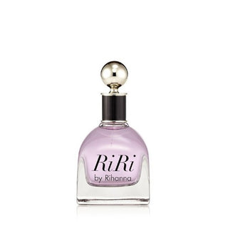 Ri Ri Perfume bottle featuring a chic and glamorous design. The fragrance reveals notes of passion fruit, jasmine, and orange blossom, creating a vibrant and sensual scent. Available at fragrancedealz.com.