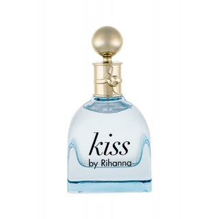 Rihanna Kiss Perfume bottle featuring a sleek and stylish design. The fragrance boasts notes of juicy fruits, delicate flowers, and warm vanilla. Available at fragrancedealz.com.