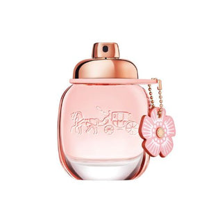 Coach Floral Perfume bottle featuring a chic and sophisticated design. The fragrance reveals notes of sparkling citrus, delicate peony, and warm woods, creating a fresh and feminine scent. Available at fragrancedealz.com.