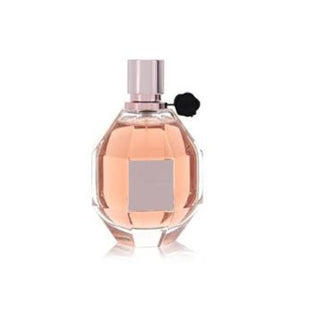 Flowerbomb Perfume bottle featuring an iconic and luxurious design. The fragrance reveals notes of floral jasmine, sweet rose, and warm patchouli, creating a rich and captivating scent. Available at fragrancedealz.com.