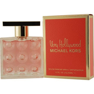 Very Hollywood Perfume bottle and side view of the box. The bottle features a glamorous design reminiscent of Hollywood glamour, while the box showcases elegant branding and accents. The perfume exudes notes of gardenia, jasmine, and amber, capturing the essence of luxury. Available at fragrancedealz.com.