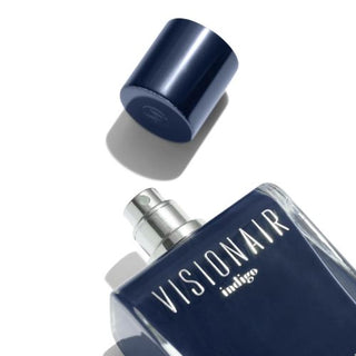 Experience the allure of Visionair Indigo with its open-cap bottle, releasing a sophisticated fragrance that captivates the senses. Available now at FragranceDealz.com.