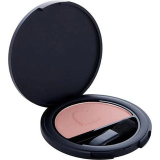 Annemarie Borlind Powder Blush in Glowy Peach is open with a blush brush nestled inside, providing a radiant finish for a healthy glow. Available at fragrancedealz.com