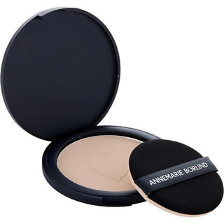 Annemarie Borlind Powder Eye Shadow is open with a heart-shaped leaf design on top and a sponge applicator included. Available at fragrancedealz.com