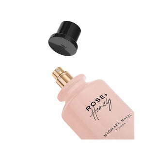 Rose Honey: Featuring an open cap bottle, inviting you to indulge in its delightful fragrance, blending the sweetness of honey with the floral essence of rose, available at fragrancedealz.com