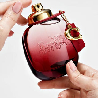 Discover the enchanting aroma of Coach Wild Rose EDP Spray, available now at fragrancedealz.com