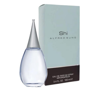 Shi Perfume bottle in front of its matching box set, offering a harmonious mix of fresh floral and woody notes, suitable for wearing in any weather, on Fragrancedealz.com