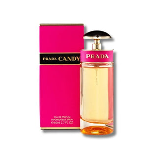 Front view presenting the elegant Prada Candy Perfume bottle and its accompanying box, with the bottle poised gracefully in front, embodying sweetness and sophistication. Explore its allure at fragrancedealz.com