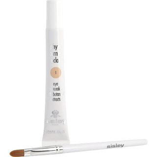 Sisley Phyto Cernes Éclat Eye Concealer #01 0.61oz comes in a sleek, compact tube designed for easy application. This concealer is ideal for brightening and concealing under-eye areas. Available now at FragranceDealz.com.