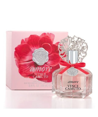 Glass bottle of Vince Camuto Amore Perfume placed in front of its stylish box, shown on Fragrancedealz.com